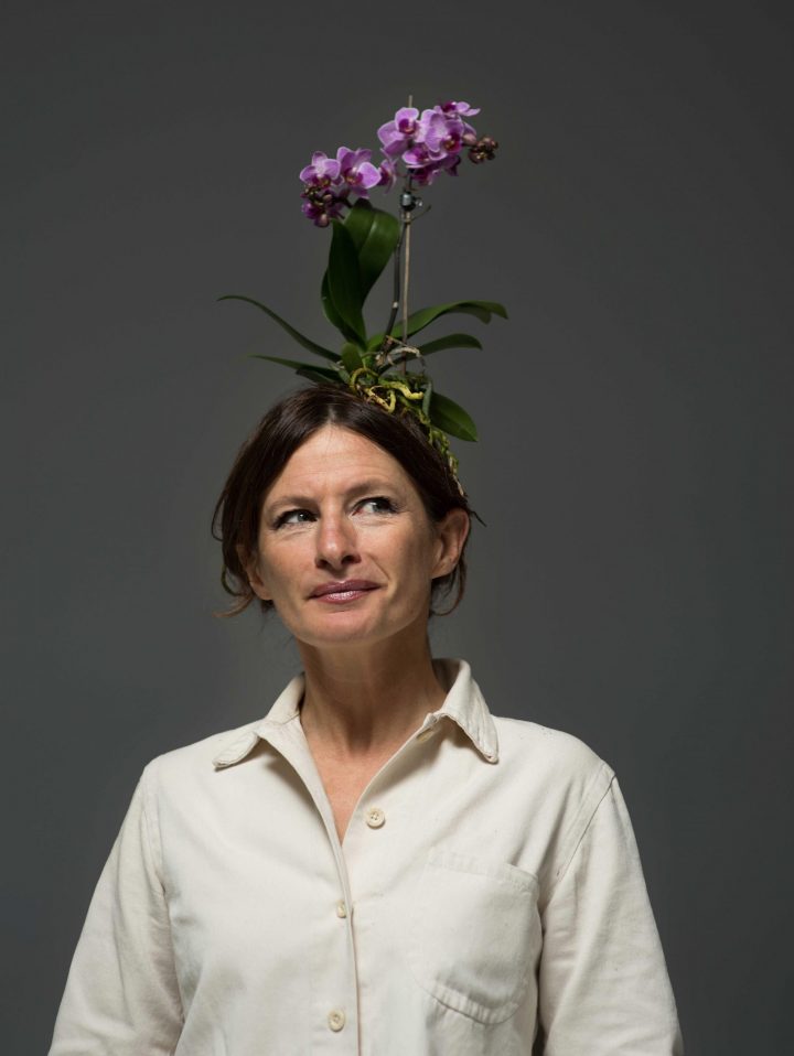 Woman with an elaborate orchid headdress