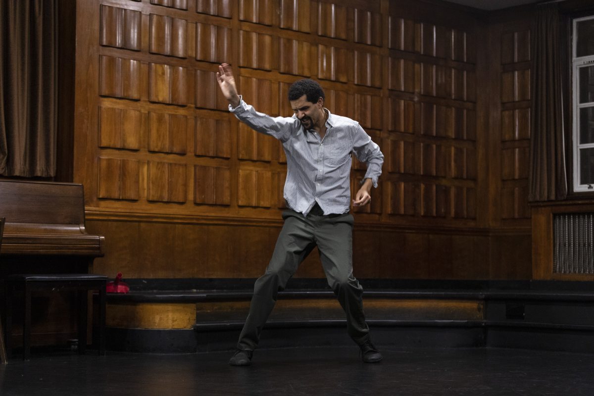 Seke Chimutengwende dancing in the Court Room at Toynbee Studios
