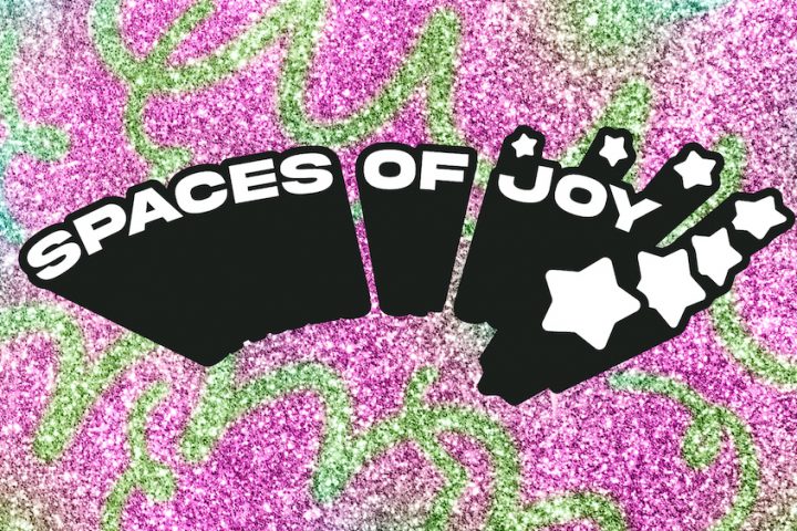 spaces of joy logo, a pink and green glittery background with