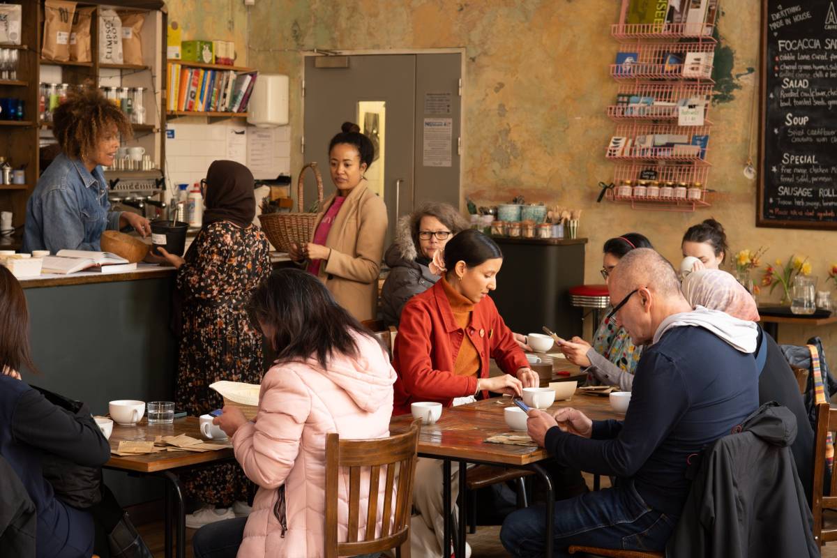 A photo of a group of people participating in a workshop